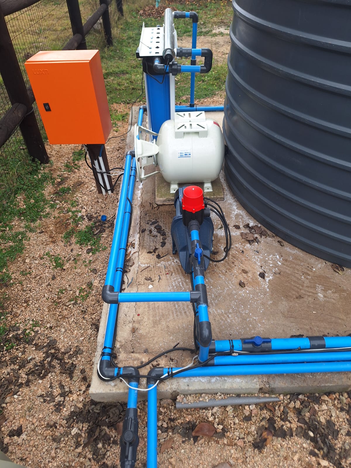 Completed borehole and tank stand installation